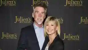 John Easterling and Olivia Newton-John at the VIP reception for upcoming "Property of Olivia Newton-John Auction Event" on October 29, 2019