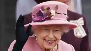 Queen Elizabeth Steps Out With A Walking Stick and A Radiant Smile Wales visit trip 2021 Charles Camilla pictures photos