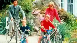 Prince Charles, Prince Harry, Prince William and Princess Diana on a bike ride