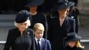 Queen Camilla, Duchess Kate, Prince George and Princess Charlotte at the funeral