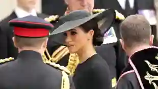 Duchess Meghan wears black and heavy make-up on the day of the Queen's funeral