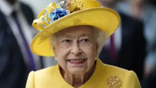 Queen Elizabeth II in a yellow suit