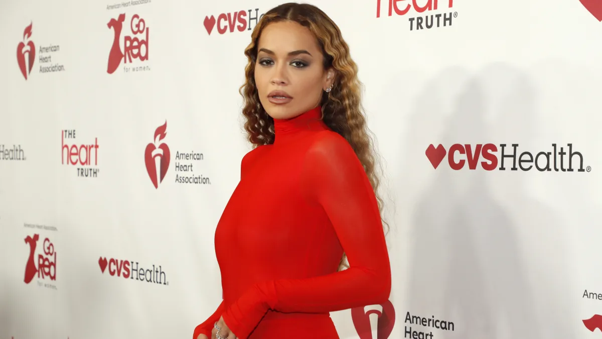 Rita Ora in a red dress in February 2023