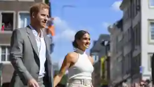 Prince Harry and Duchess Meghan holding hands in Dusseldorf for the Invictus Games 2023