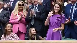 Princess Kate waves to the spectators at Wimbledon