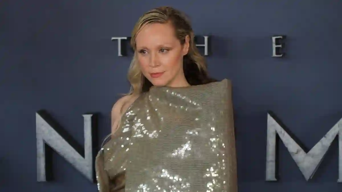 Gwendoline Christie in a glittery dress at the "Sandman" premiere