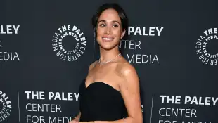 Duchess Meghan in a black dress