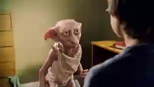 HARRY POTTER AND THE CHAMBER OF SECRETS, Dobby the House Elf, Daniel Radcliffe, 2002, (c) Warner Brothers/courtesy Evere