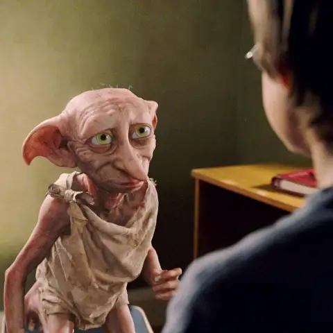 HARRY POTTER AND THE CHAMBER OF SECRETS, Dobby the House Elf, Daniel Radcliffe, 2002, (c) Warner Brothers/courtesy Evere