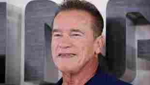 Arnold Schwarzenegger Dons "We'll Be Back" Mask While Out Biking