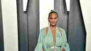 Chrissy Teigen Shares ‘Thirst Trap’ Swimsuit Photo Of Herself And Her New Dog Petey