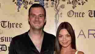 Cooper Hefner and his fiance Scarlett Byrne arrive at Playboy's Midsummer Night's Dream at the Marquee Nightclub on July 28, 2018