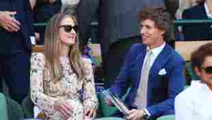 Eddie Redmayne and his wife Hannah Bagshawe attend the men's singles final at Wimbledon 2018