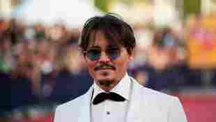 ohnny Depp poses on the red carpet as he arrives for the screening of the movie "Waiting for the Barbarians" at the 45th Deauville US Film Festival on September 8, 2019.