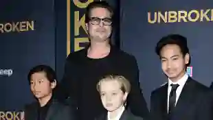 Brad Pitt and children Pax Jolie-Pitt, Shiloh Jolie-Pitt and Maddox Jolie-Pitt arrive for the U.S. premiere of Universal Pictures "Unbroken".
