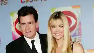 Actor Charlie Sheen and a pregnant Denise Richards attend "CBS at 75" television gala, 2003