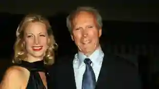 Clint Eastwood and daughter Director Alison Eastwood arrive at the premiere of Rails and Ties, 23 October 2007, in Los Angeles, California
