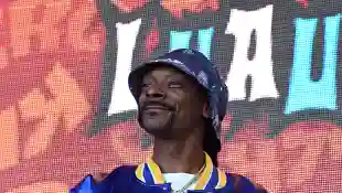 Snoop Dogg performing onstage at the 2019 KROQ Weenie Roast in Dana Point, California.