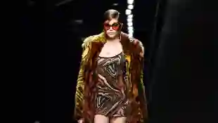 Kaia Gerber presents a creation for Versace' Women Fall - Winter 2020 fashion collection during Milan Fashion Week