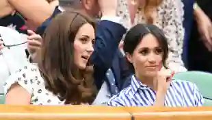 Kate Middleton and Meghan Markle attend Wimbledon 2018.