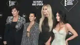 Kris Jenner, Kourtney Kardashian, Khloe Kardashian, and Kim Kardashian West attend the 2019 E! People's Choice Awards.