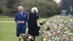 Prince Charles tears up visiting public tributes after Prince Philip's death buckingham palace photos pictures Camilla royal family 2021