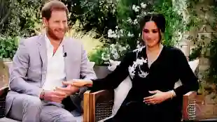 Prince Harry and Meghan, the Duke and Duchess of Sussex, in a scene from their interview with Oprah Winfrey, Oprah with Meghan and Harry: A Primetime Special.
