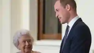 Queen Elizabeth II stands with Prince William at Buckingham Palace in London in 2017. COVID-19 pandemic, William concerned about the Queen and Prince Charles