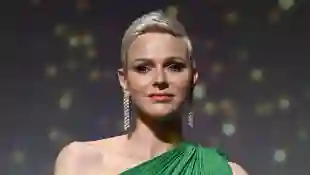 Princess Charlene of Monaco rarely see like this one shoulder dress after COVID-19 health problems Prince Albert Monaco royals news latest