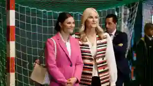 Princess Victoria and Princess Mette-Marit performing girlfriends