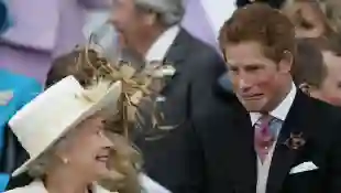 Prince Harry and Queen Elizabeth II share a laugh.
