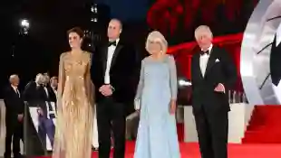 The Royals Hit The Red Carpet At No Time To Die world Premiere event Prince WIlliam and Kate Charles Camilla film movie Daniel Craig pictures photos Royal Family news suit dress tuxedo