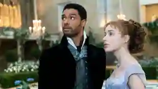 Regé-Jean Page and Phoebe Dynevor in a scene from the series 'Bridgerton'