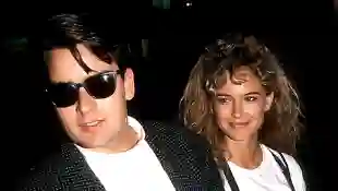 CHARLIE SHEEN AND KELLY PRESTON in 1989.
