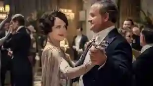 Elizabeth McGovern and Hugh Bonneville as "Cora" and "Robert" in Downton Abbey.