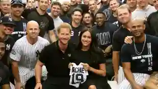 Prince Harry and Duchess Meghan with the New York Yankees