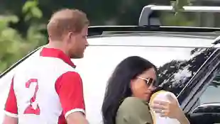 Prince Harry, Duchess Meghan and Archie at the Royal Charity Polo Match