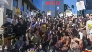 November 8, 2023, Los Angeles, California, United States: Striking SAG-AFTRA members walk with pickets outside Netflix s
