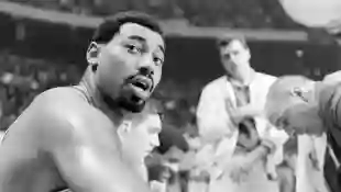 Philadelphia  76'ers,  Wilt  Chamberlain  (#13),  during  game  against  Boston  Celtics,  in  the