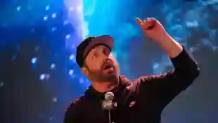Syndication: The Tennessean Garth Brooks entertains questions on the stage of his new honky-tonk, Friends in Low Places,