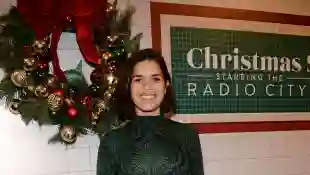 America Ferrera is all smiles and in the holiday spirit after taking her family to The Christmas Spectacular starring Th