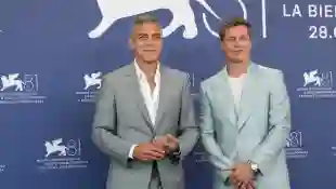 American actors George Clooney and Brad Pitt at the 81 Venice International Film Festival 2024. Wolfs (Lobos) photocall.