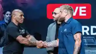 May 13, 2024, New York, New York, USA: MIKE TYSON and JAKE PAUL shake hands at the Apollo Theater press conference, PK,