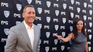 Actors and husband and wife Angelo Pagan (L) and Leah Remini attend FOX Sports/PAC-10 Conference Hollywood premiere nigh