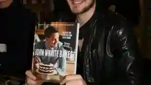 John Whaite with his book "John Whaite Bakes" in London, 2014.