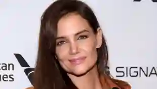 Katie Holmes talked about her life with daughter Suri and how the "grew up together".