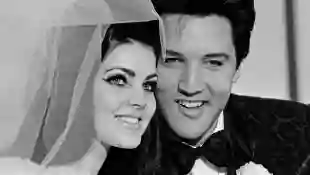 Priscilla Presley and Elvis Presley on their wedding day