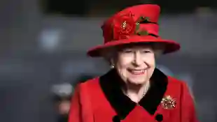Queen Elizabeth II reacts during her visit to the aircraft carrier HMS Queen Elizabeth in Portsmouth, southern England on May 22, 2021.