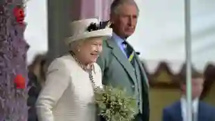 La reina Isabel y el príncipe Carlos