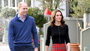 Prince William and Duchess Catherine host a Christmas party for military personnel at Kensington Palace
